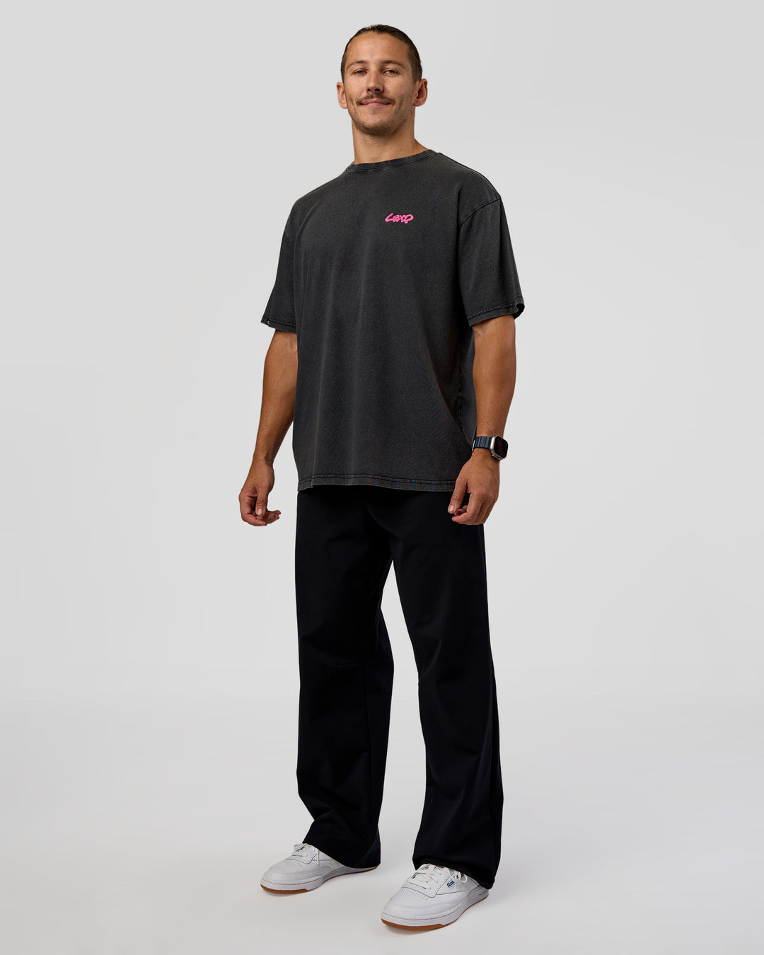 Man wearing Break Through FLXCotton Oversized Tee - Black-Plum Caspia | Model:Jaiden | Size:L - view 5