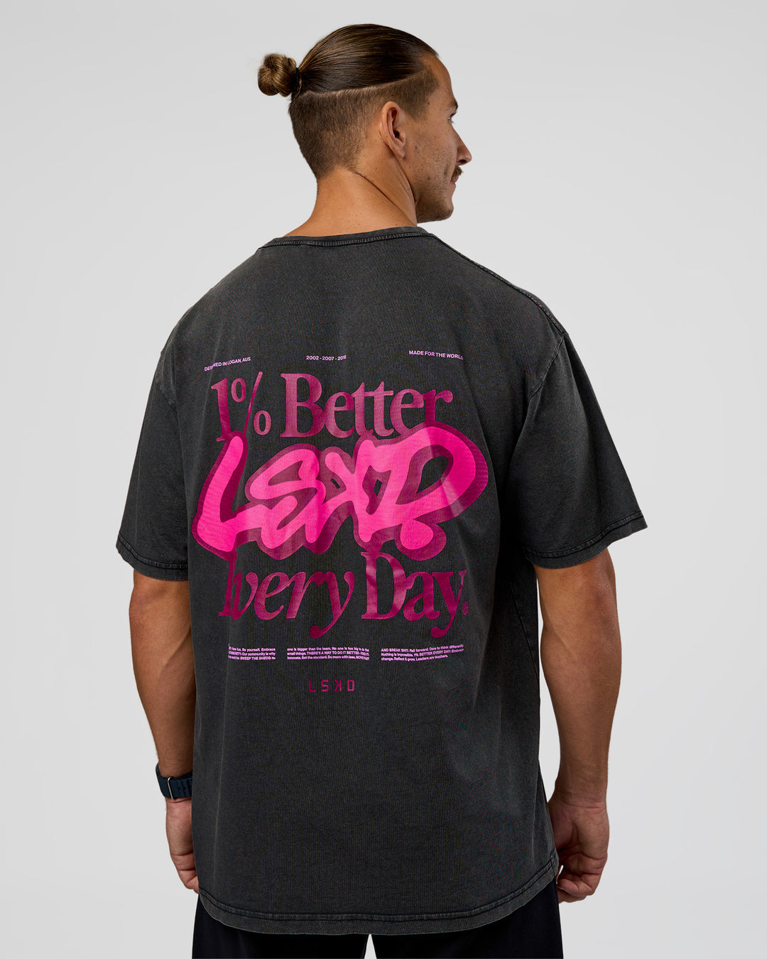 Man wearing Break Through FLXCotton Oversized Tee - Black-Plum Caspia | Model:Jaiden | Size:L - view 1