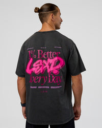 Man wearing Break Through FLXCotton Oversized Tee - Black-Plum Caspia | Model:Jaiden | Size:L | Thumbnail Index: 0