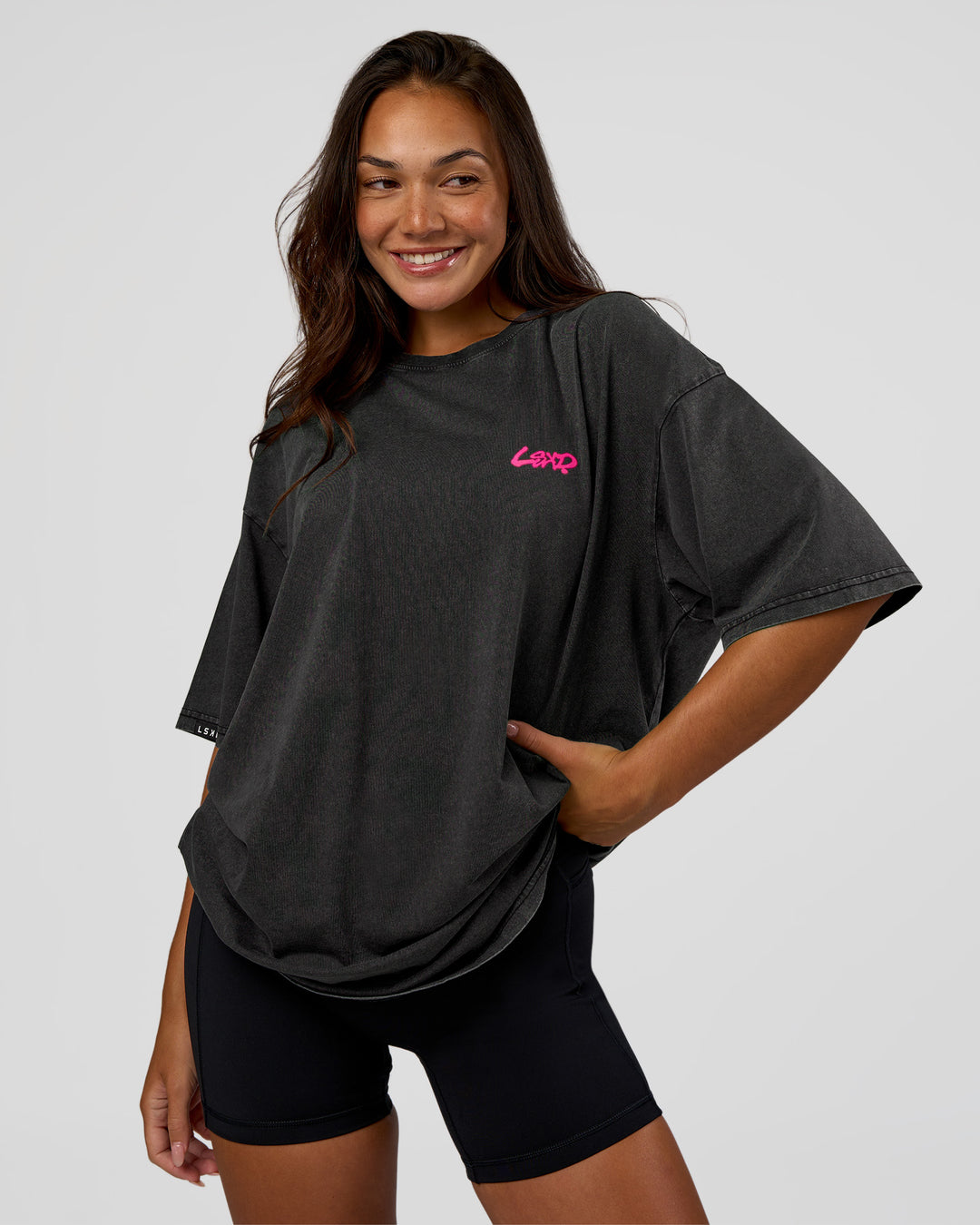 Woman wearing Break Through FLXCotton Oversized Tee - Black-Plum Caspia | Model:Kirstyn | Size:L - view 3