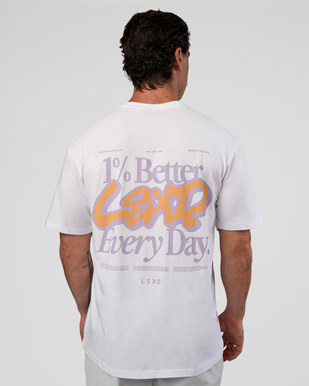 Man wearing Break Through FLXCotton Oversized Tee - White-Pale Lilac | Model:Adam | Size:L - view 2