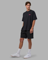 Man wearing Break Through Heavyweight Oversized Tee - Black Washed-Plum Caspia | Model:Brandon | Size:L | Thumbnail Index: 5