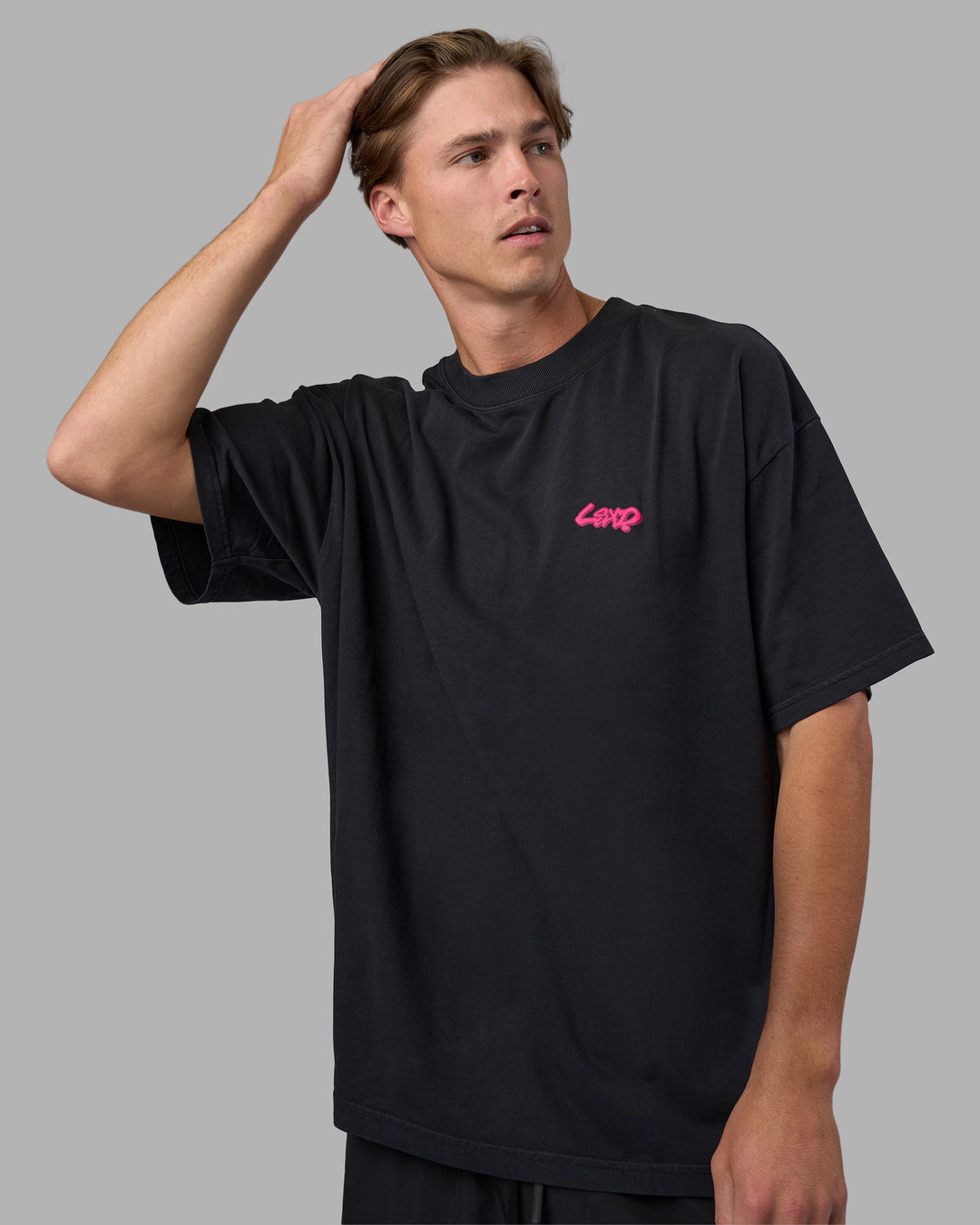 Man wearing Break Through Heavyweight Oversized Tee - Black Washed-Plum Caspia | Model:Brandon | Size:L - view 2