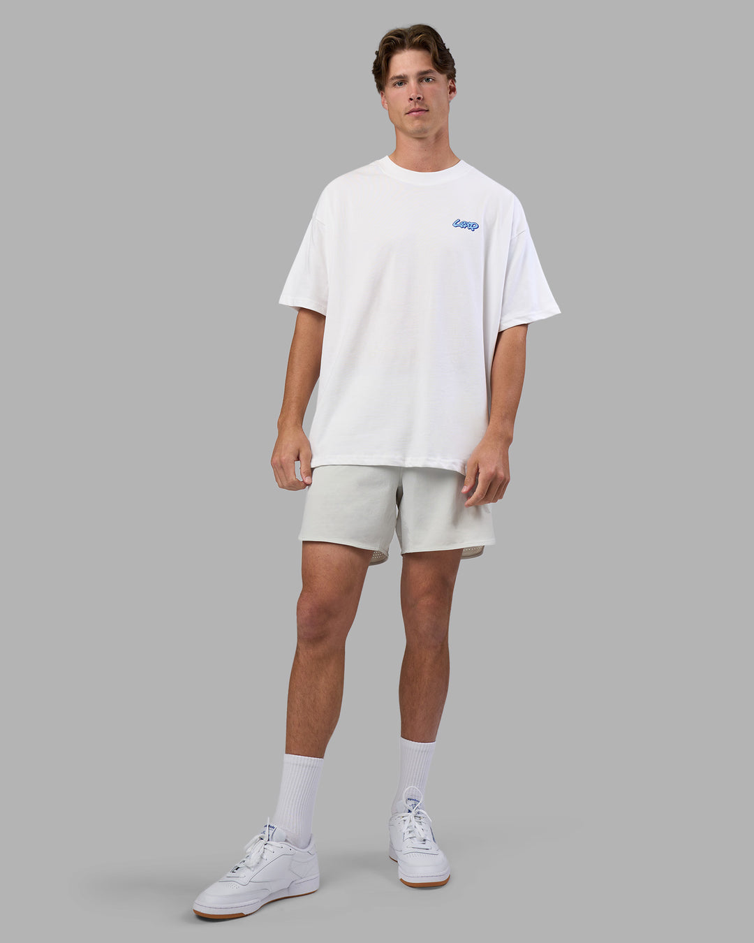 Man wearing Break Through Heavyweight Oversized Tee - White-Power Cobalt | Model:Brandon | Size:L - view 6