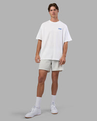 Man wearing Break Through Heavyweight Oversized Tee - White-Power Cobalt | Model:Brandon | Size:L | Thumbnail Index: 5
