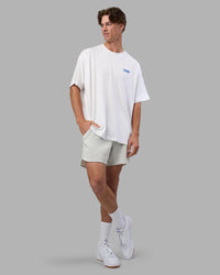 Man wearing Break Through Heavyweight Oversized Tee - White-Power Cobalt | Model:Brandon | Size:L | Thumbnail Index: 2