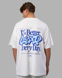 Man wearing Break Through Heavyweight Oversized Tee - White-Power Cobalt | Model:Brandon | Size:L | Thumbnail Index: 1