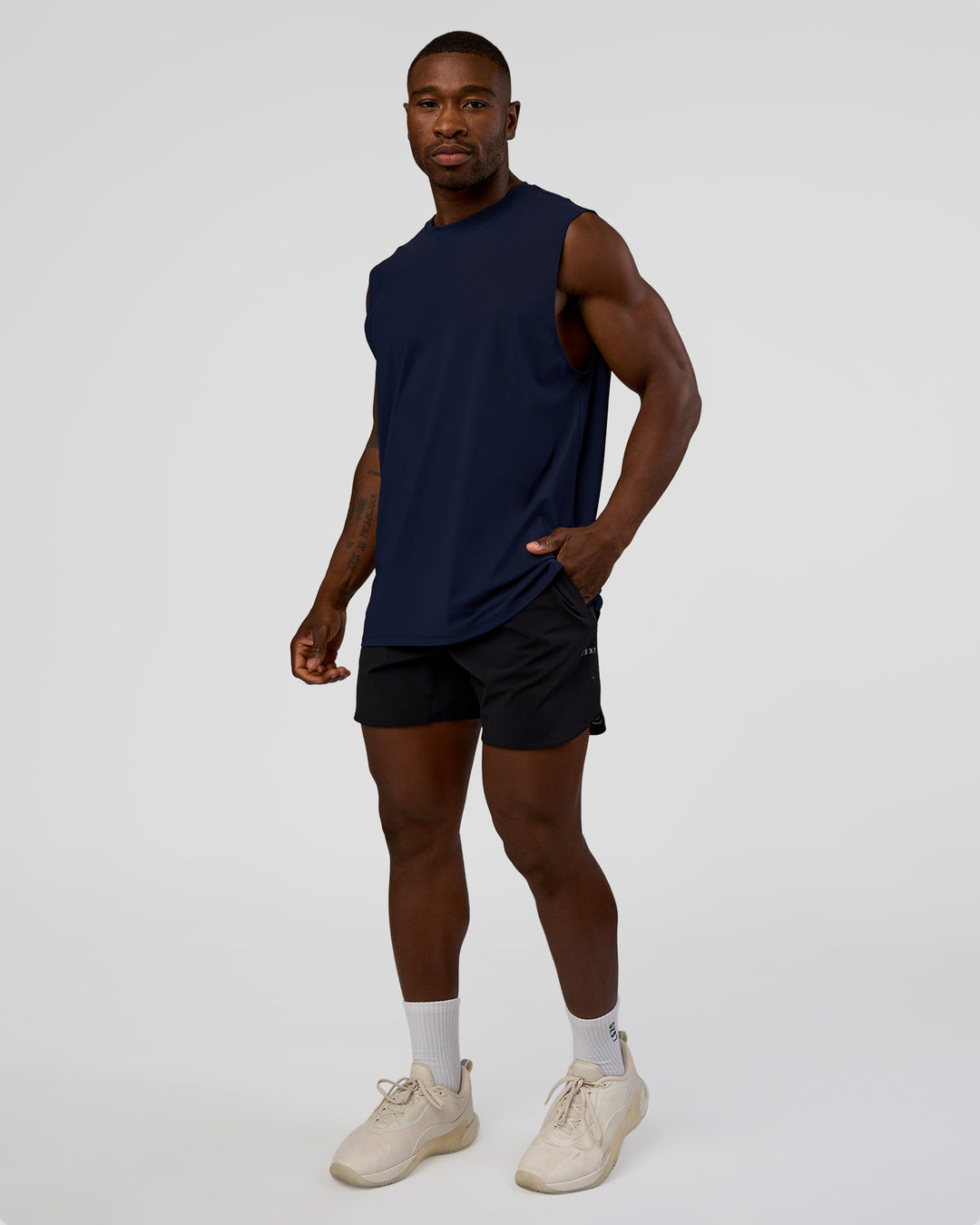 Man wearing Cadence MicroMotion Muscle Tank - Future Navy | Model:Sam | Size:L - view 2