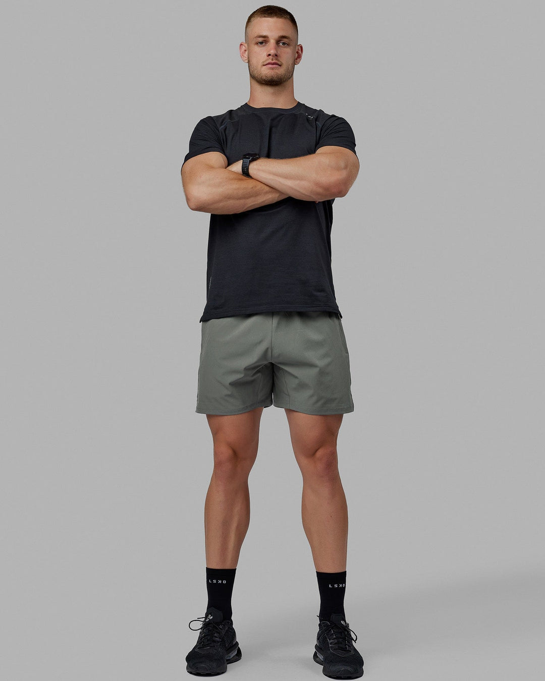 Man wearing Challenger 6" Performance Shorts - Graphite - view 2