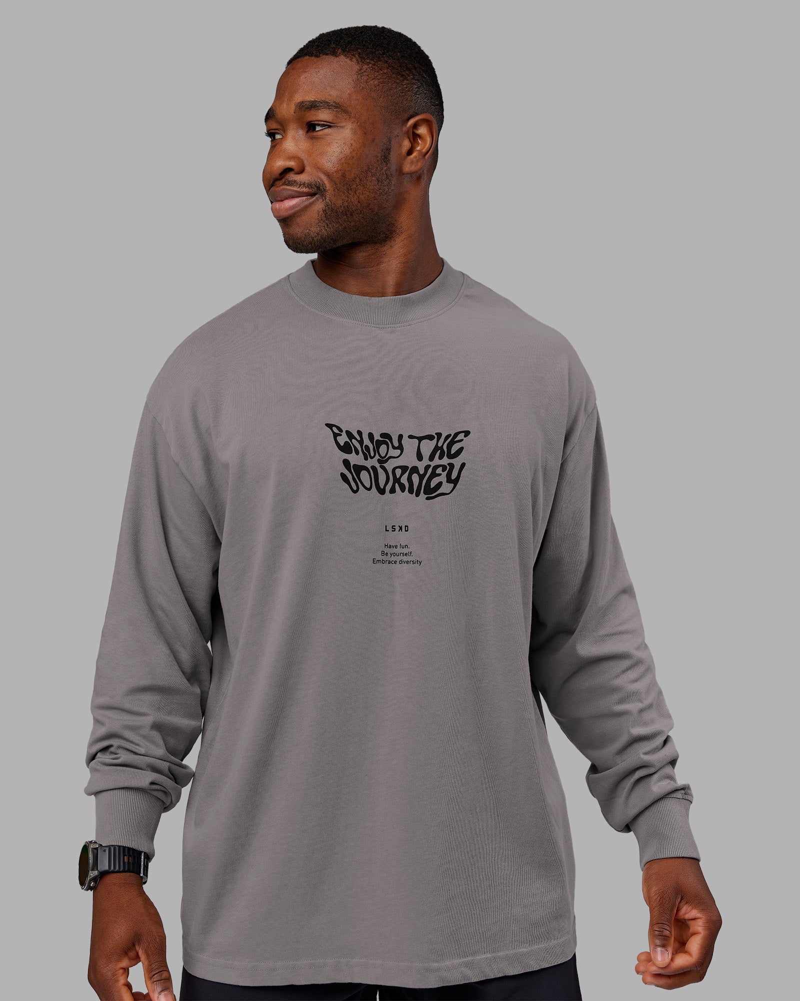 Man wearing Chrome Washed Heavyweight Oversized Long Sleeve Tee - Circular Grey-Black | Model:Sam | Size:L