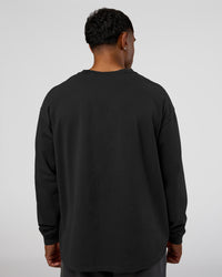 Man wearing Classic Heavyweight FLXCotton Oversized Long Sleeve Tee - Washed Black-Black | Model:Xav | Size:L | Thumbnail Index: 2