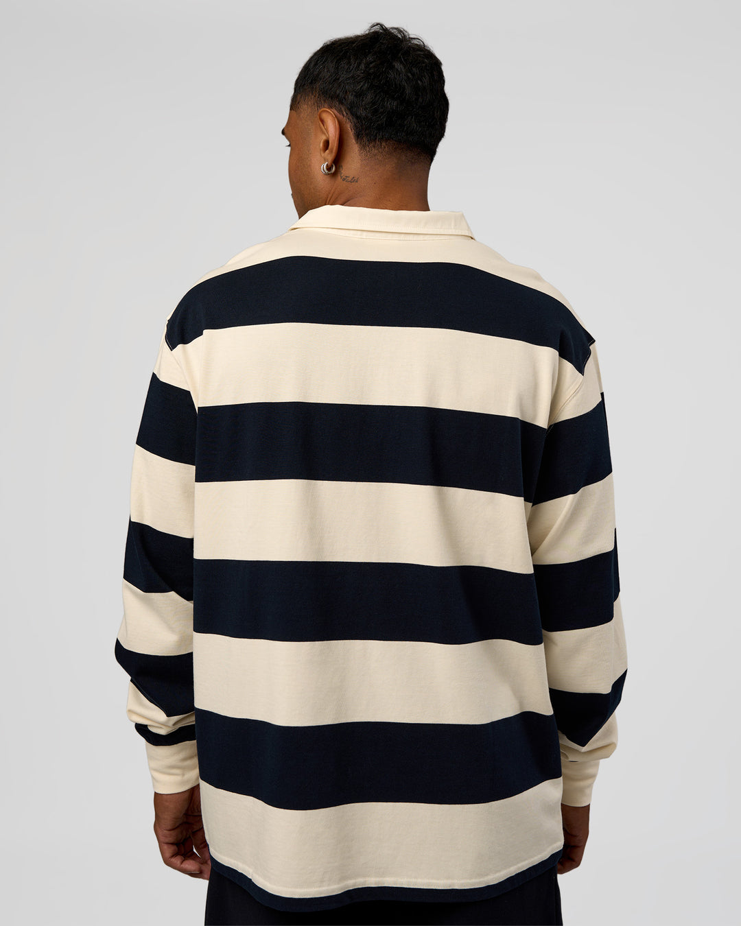 Man wearing Clubhouse Unisex Rugby Polo - Future Navy-Off White | Model:Xav | Size:L - view 7