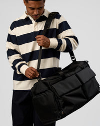 Man wearing Clubhouse Unisex Rugby Polo - Future Navy-Off White | Model:Xav | Size:L | Thumbnail Index: 10