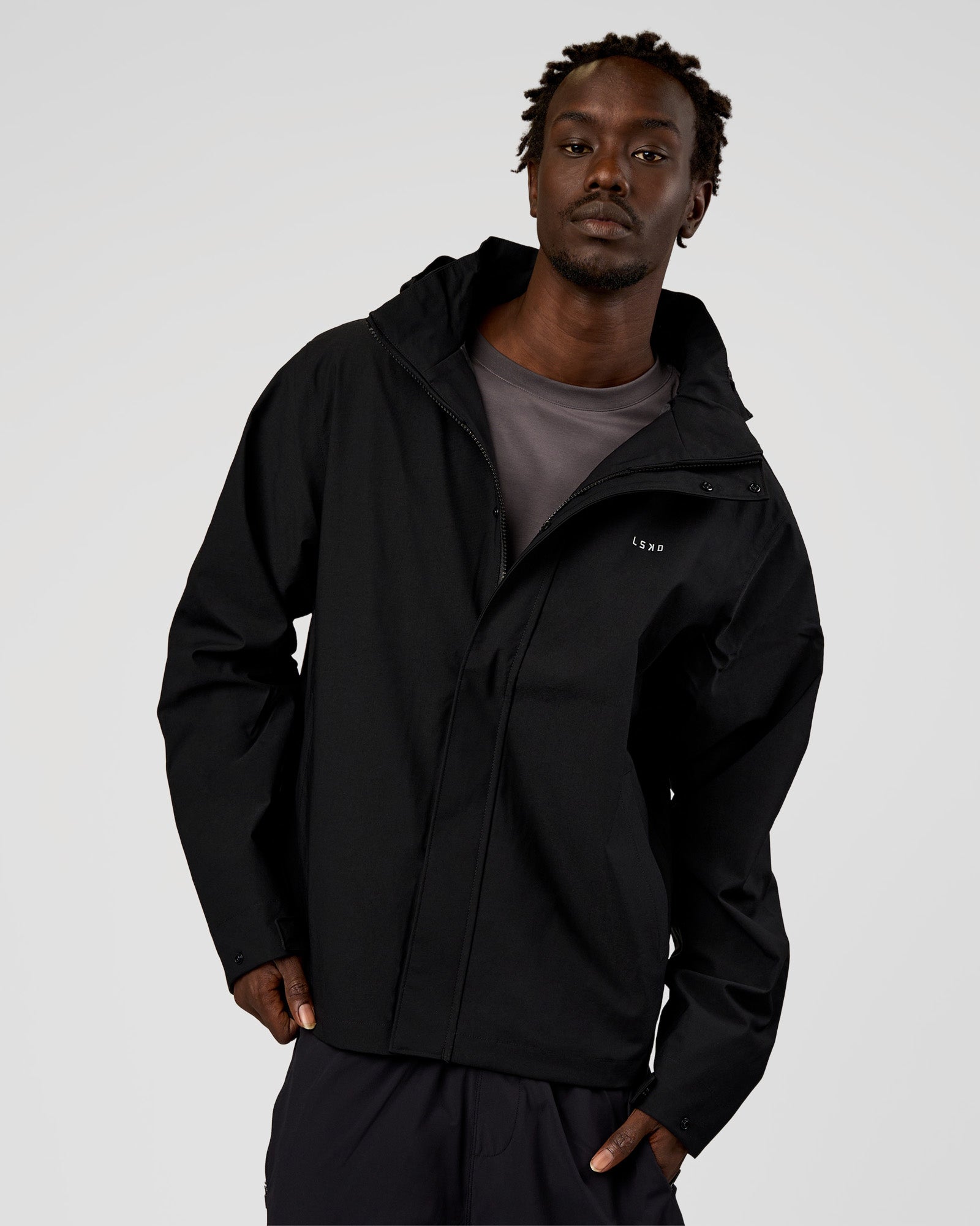 Man wearing Coaches Jacket - Black | Model:Okello | Size:L