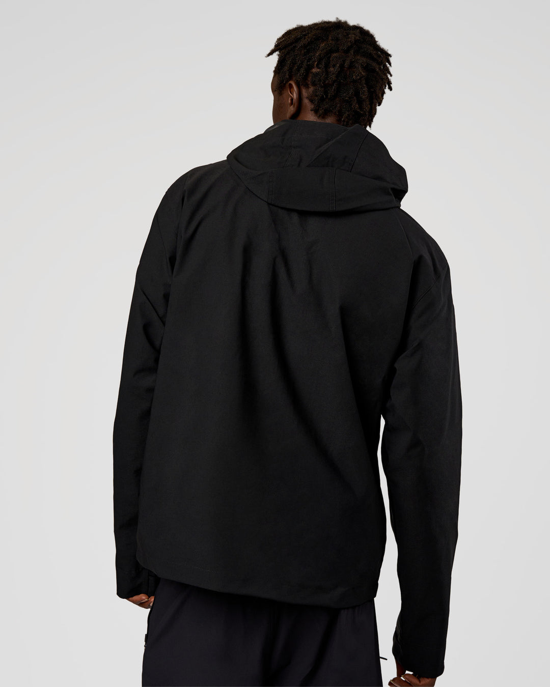 Man wearing Coaches Jacket - Black | Model:Okello | Size:L - view 4