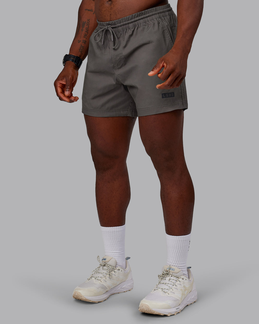 Man wearing Daily 5" Short - Dark Storm | Model:Sam | Size:L - view 4