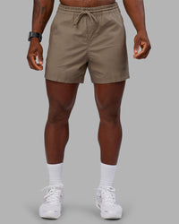 Man wearing Daily 5" Short - Greige | Model:Sam | Size:L | Thumbnail Index: 0
