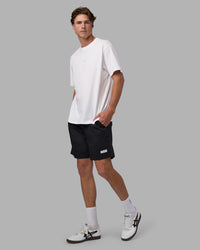 Man wearing Daily 7" Short - Black-White | Model:Brandon | Size:L | Thumbnail Index: 2