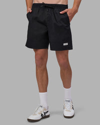 Man wearing Daily 7" Short - Black-White | Model:Brandon | Size:L | Thumbnail Index: 1