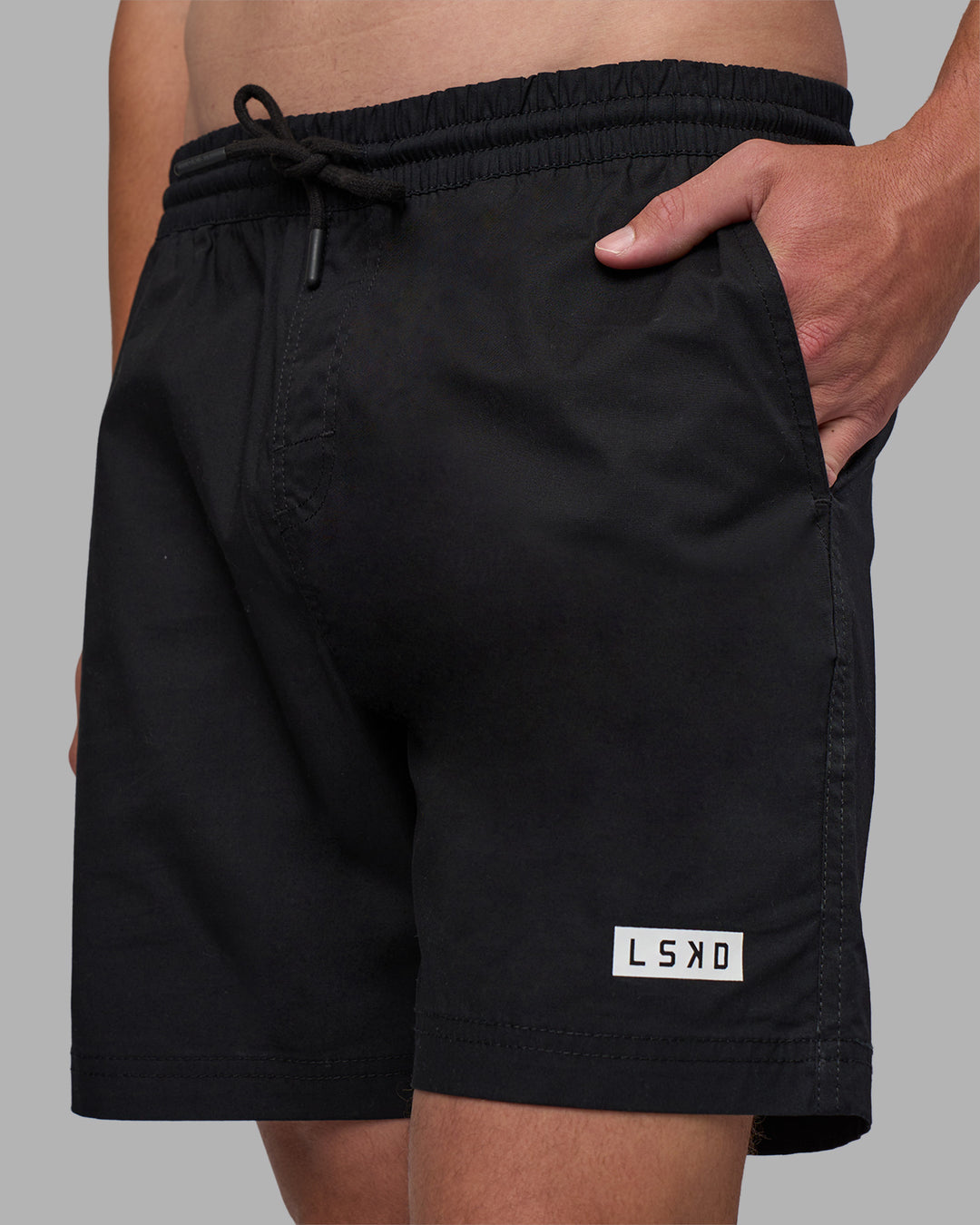 Man wearing Daily 7" Short - Black-White | Model:Brandon | Size:L - view 1