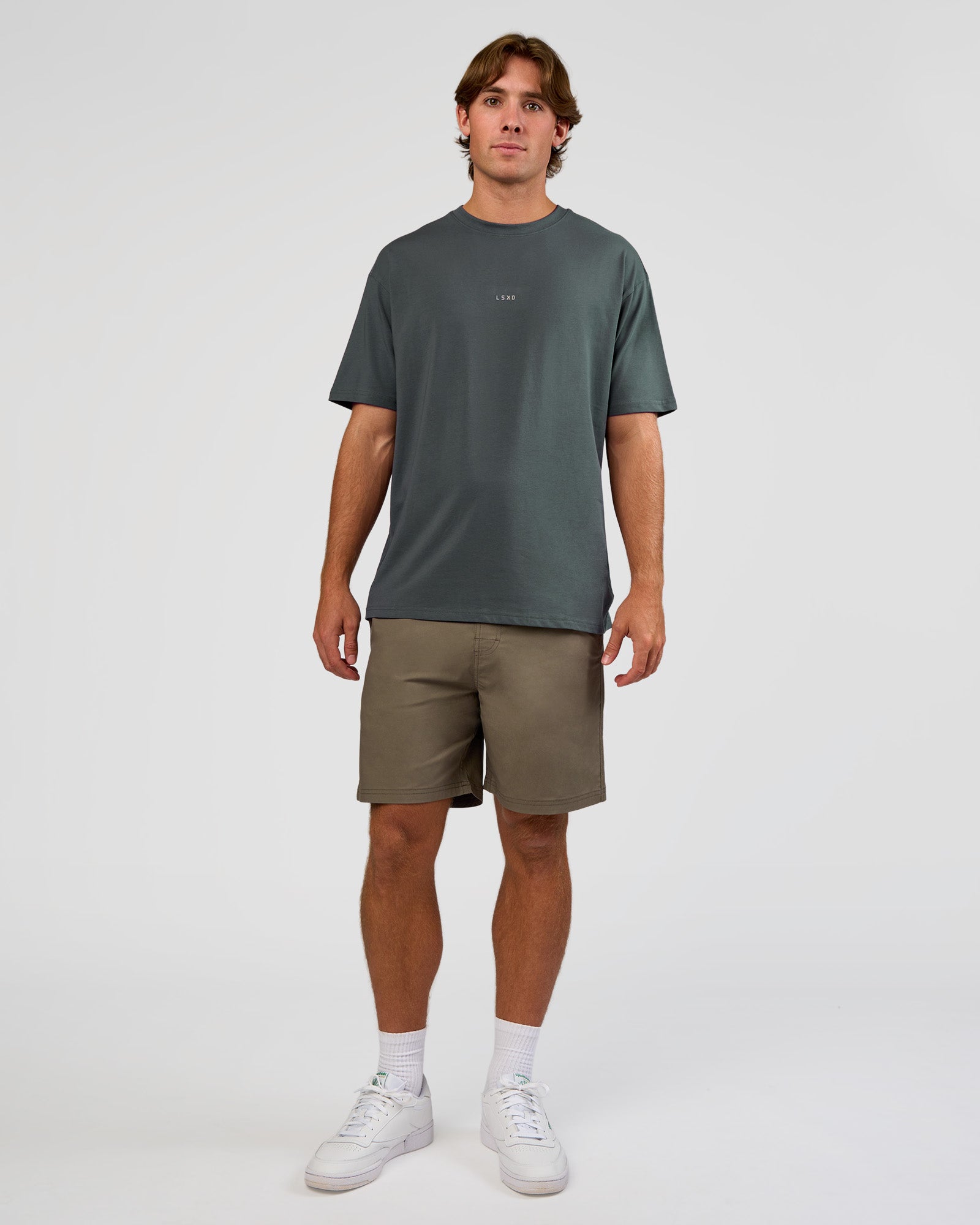 Man wearing Daily 7" Short - Walnut Grey | Model:Marcus | Size:L
