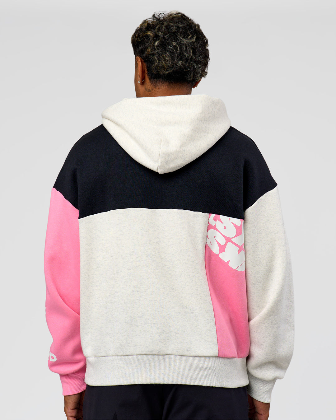 Man wearing Deconstructed Fleece Hoodie - Caviar-Candy Pink-Grey Marl | Model:Xav | Size:L - view 9