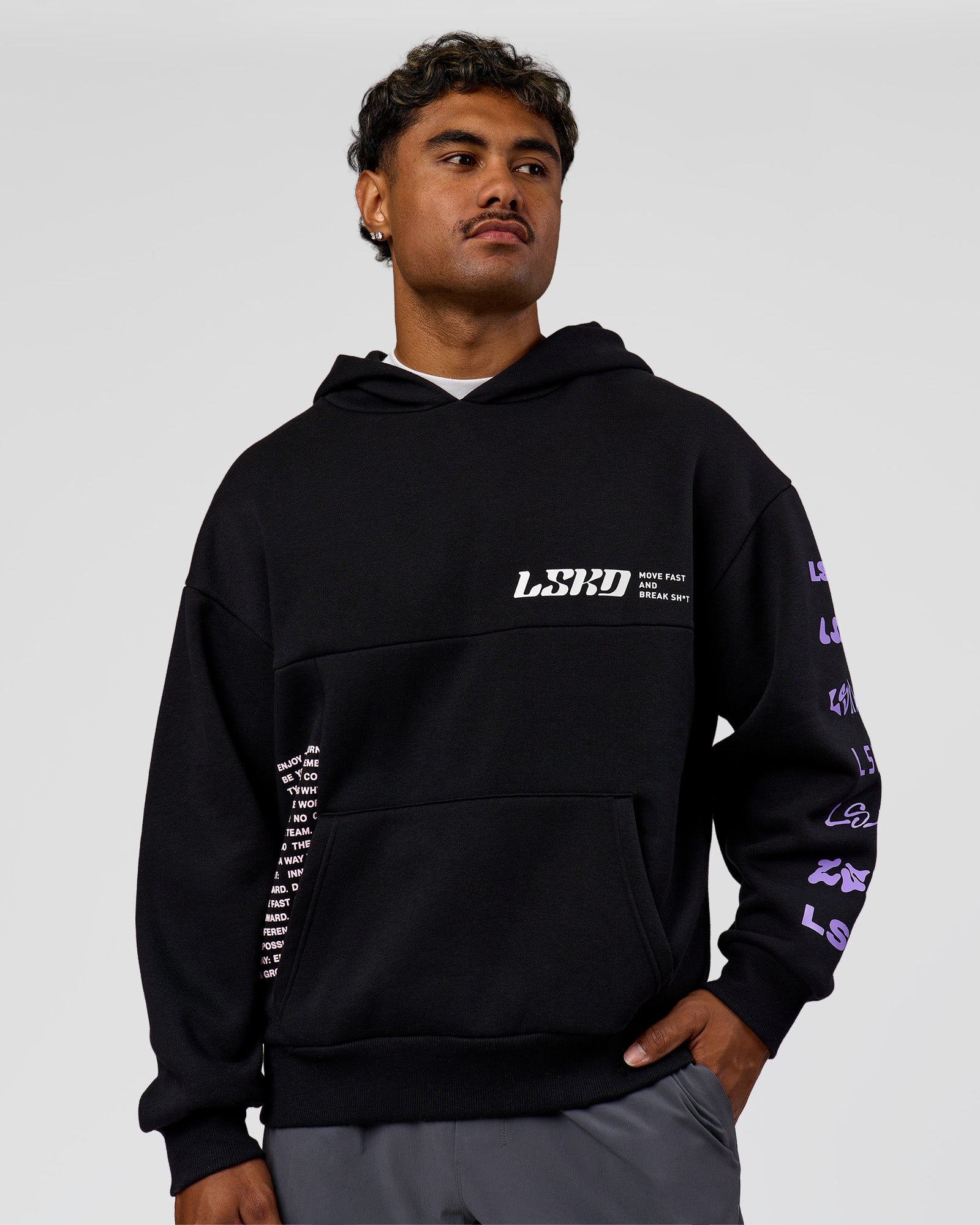 Man wearing Deconstructed Fleece Hoodie - Caviar-Marshmallow-Pale Lilac | Model:Xav | Size:L