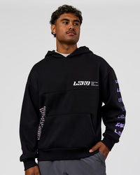 Man wearing Deconstructed Fleece Hoodie - Caviar-Marshmallow-Pale Lilac | Model:Xav | Size:L | Thumbnail Index: 1