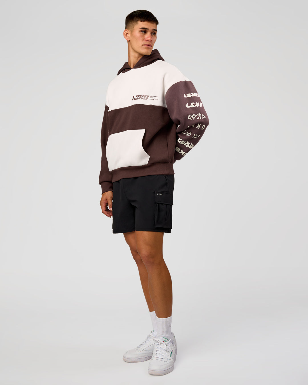Man wearing Deconstructed Fleece Hoodie - Off White-Cocoa Powder-Choc | Model:Jackson | Size:L - view 3