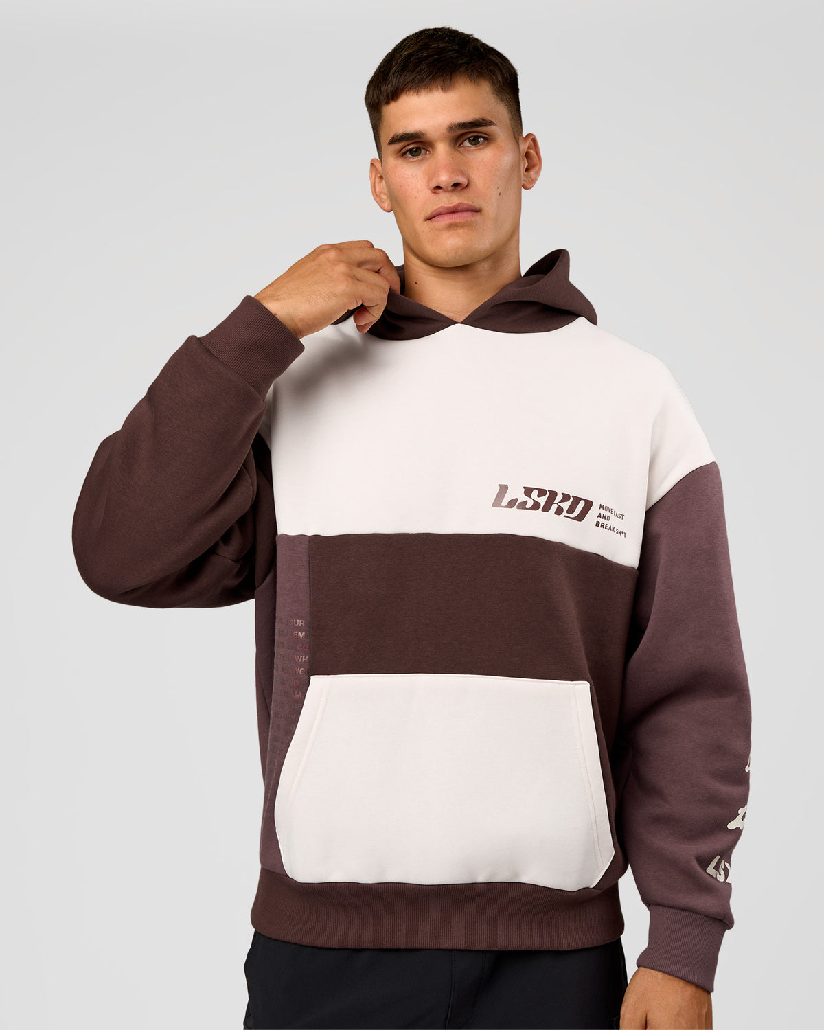 Man wearing Deconstructed Fleece Hoodie - Off White-Cocoa Powder-Choc | Model:Jackson | Size:L