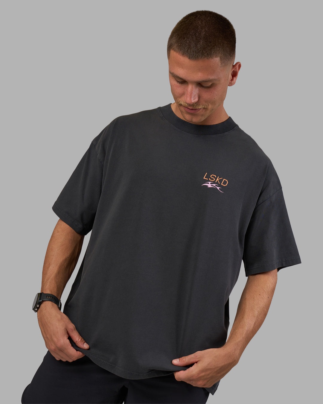 Man wearing Digital World Heavyweight Oversized Tee - Washed Black | Model:Nikola | Size:L - view 3