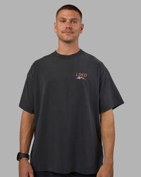 Man wearing Digital World Heavyweight Oversized Tee - Washed Black | Model:Nikola | Size:L | Thumbnail Index: 9
