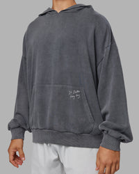 Man wearing ETJ Values Washed Unisex Oversize Hoodie - Dark Storm-Light Bubblegum | Model:Jackson | Size:L | Thumbnail Index: 7