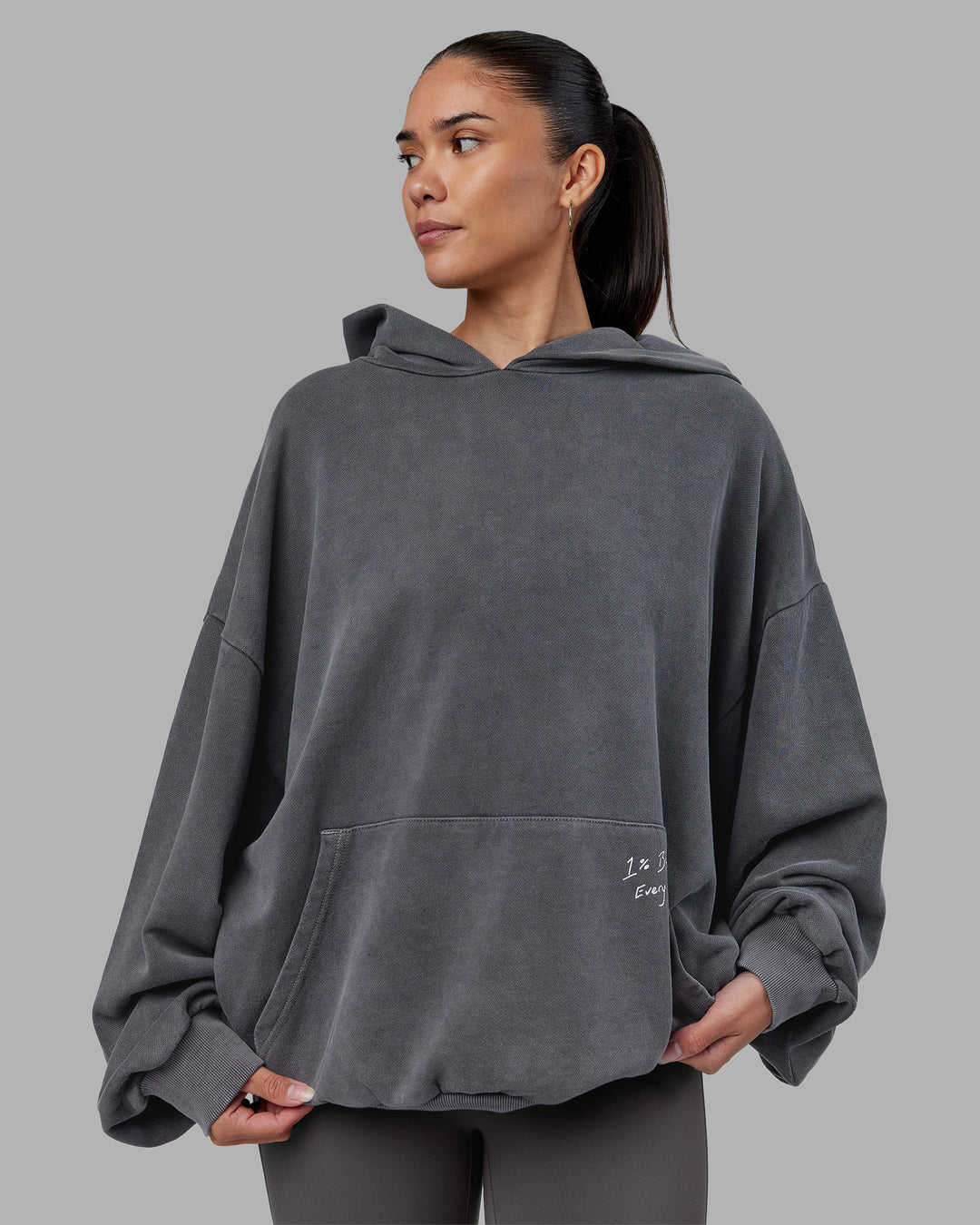 Woman wearing ETJ Values Washed Unisex Oversize Hoodie - Dark Storm-Light Bubblegum | Model:Rhiley | Size:L - view 4