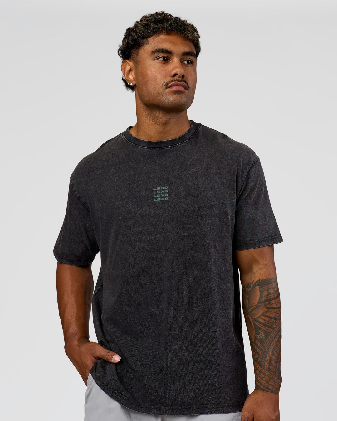 Man wearing Everyday Elevation FLXCotton Oversized Tee - Black Washed-Carbon Green | Model:Xav | Size:L - view 4