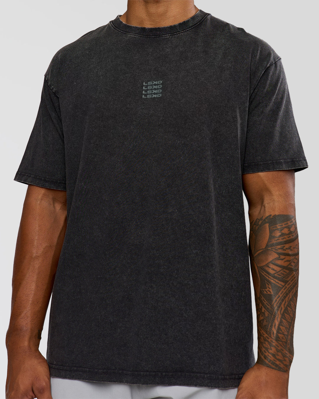 Man wearing Everyday Elevation FLXCotton Oversized Tee - Black Washed-Carbon Green | Model:Xav | Size:L - view 8