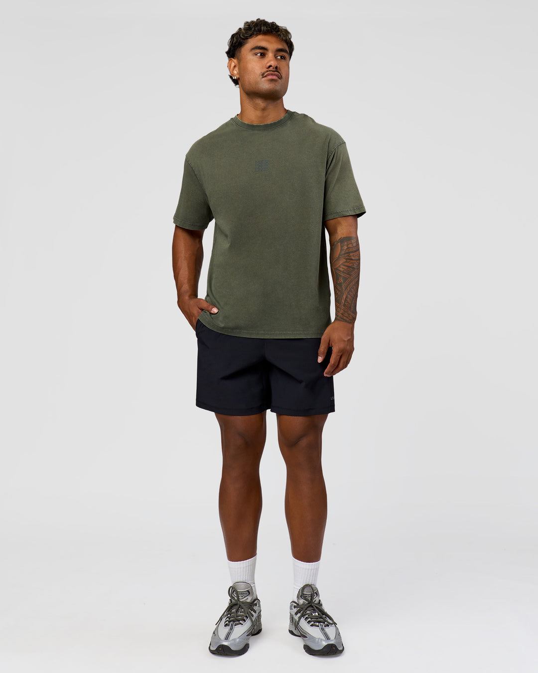 Man wearing Everyday Elevation FLXCotton Oversized Tee - Carbon Green Washed -White | Model:Xav | Size:L - view 3