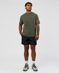 Man wearing Everyday Elevation FLXCotton Oversized Tee - Carbon Green Washed -White | Model:Xav | Size:L | Thumbnail Index: 2