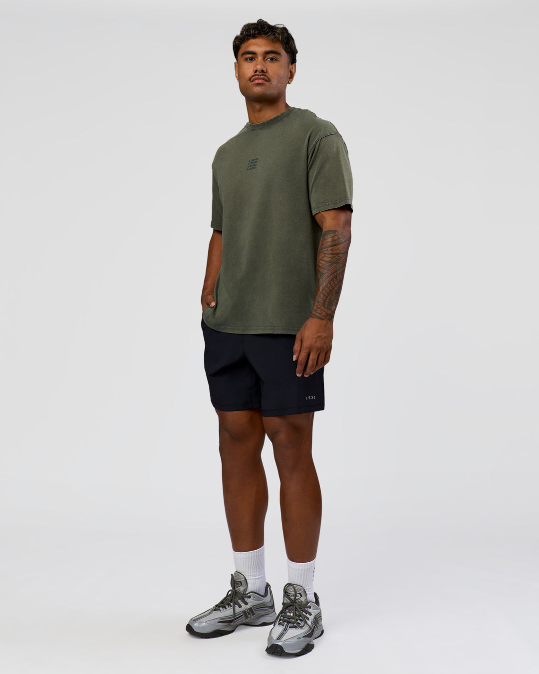 Man wearing Everyday Elevation FLXCotton Oversized Tee - Carbon Green Washed -White | Model:Xav | Size:L - view 5