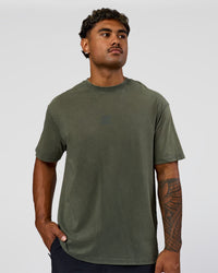 Man wearing Everyday Elevation FLXCotton Oversized Tee - Carbon Green Washed -White | Model:Xav | Size:L | Thumbnail Index: 6