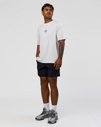 Man wearing Everyday Elevation FLXCotton Oversized Tee - White-Carbon Green | Model:Xav | Size:L | Thumbnail Index: 3