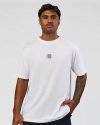 Man wearing Everyday Elevation FLXCotton Oversized Tee - White-Carbon Green | Model:Xav | Size:L | Thumbnail Index: 4