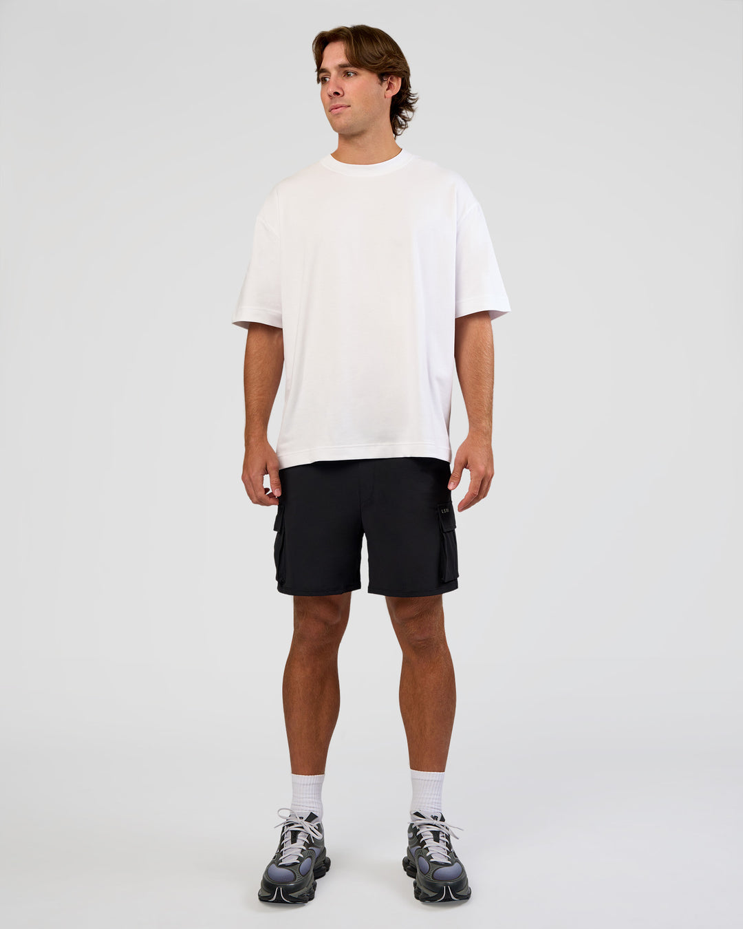 Man wearing Functional Cargo 6" Short - Black | Model:Marcus | Size:L - view 8