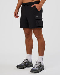 Man wearing Functional Cargo 6" Short - Black | Model:Marcus | Size:L | Thumbnail Index: 0