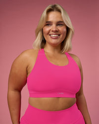 Woman wearing Fusion Sports Bra 2.0 - Ultra Pink | Model:Bianca | Size:L | Thumbnail Index: 0