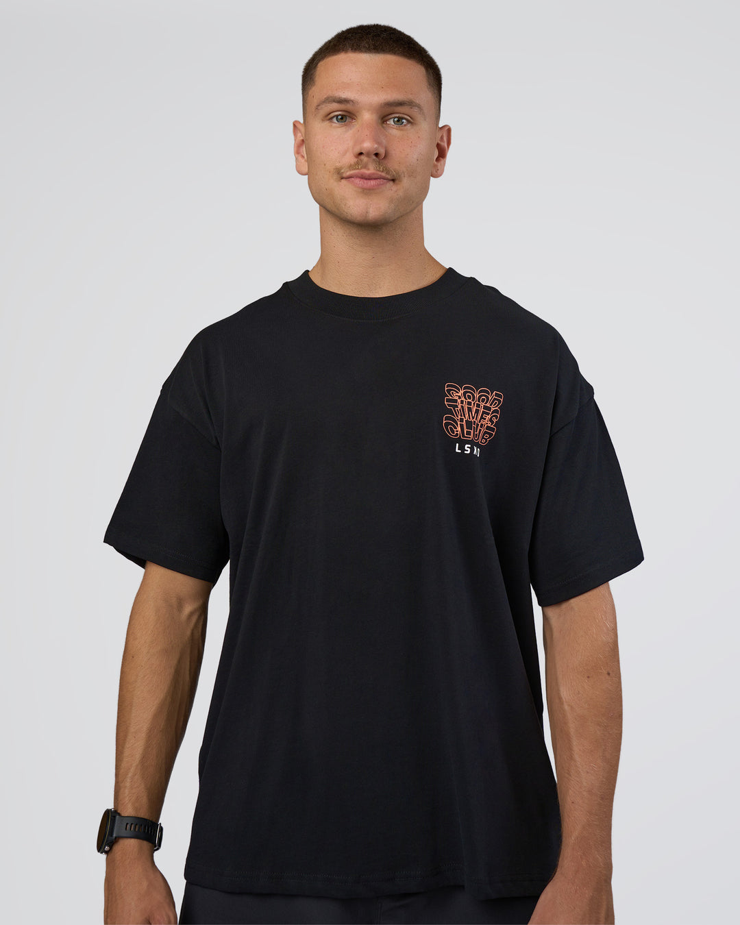 Man wearing GTC Heavyweight Oversized Tee - Black-Cantaloupe | Model:Nikola | Size:L - view 2