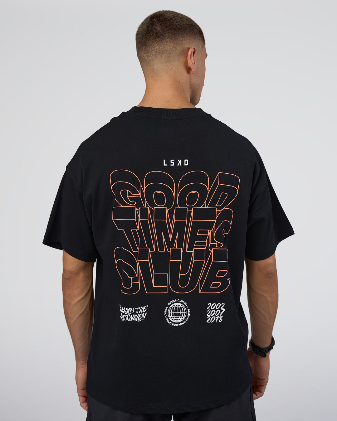 Man wearing GTC Heavyweight Oversized Tee - Black-Cantaloupe | Model:Nikola | Size:L - view 3
