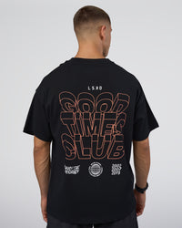 Man wearing GTC Heavyweight Oversized Tee - Black-Cantaloupe | Model:Nikola | Size:L | Thumbnail Index: 2