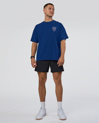 Man wearing GTC Heavyweight Oversized Tee - Washed Midnight Blue-Marsh | Model:Nikola | Size:L | Thumbnail Index: 2