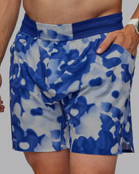 Man wearing Grand Slam 6" Shorts in Wildflower Midnight Blue | Size:L | Thumbnail Index: 2